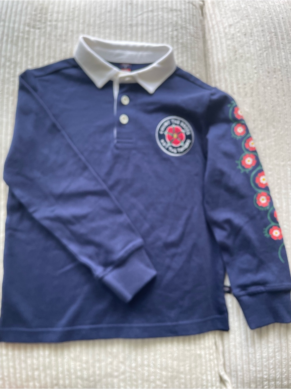 Rowing Blazers Navy Long-Sleeve Polo with White Collar and Red Floral Sleeve